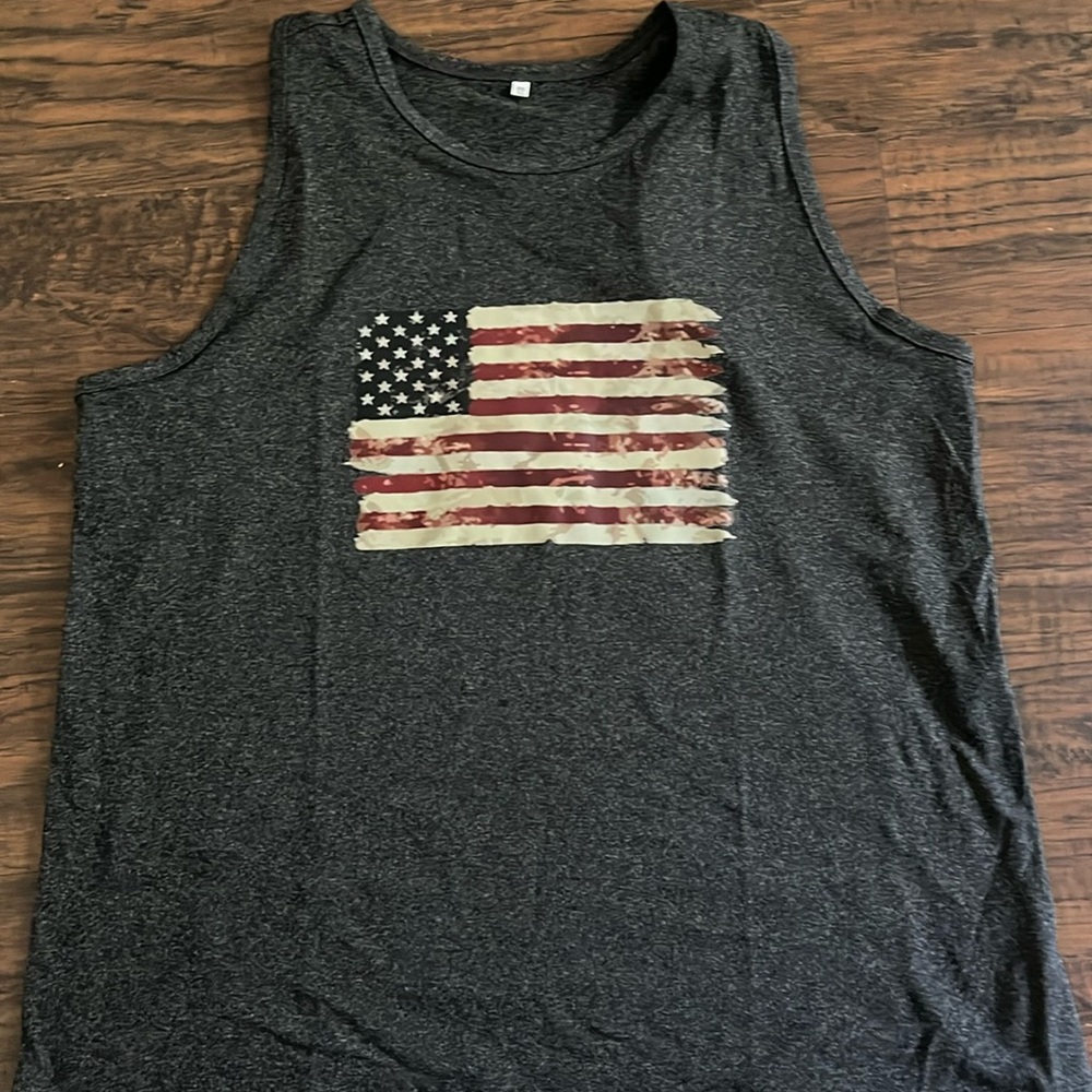 Woman’s American flag new  tank, never worn or washed..